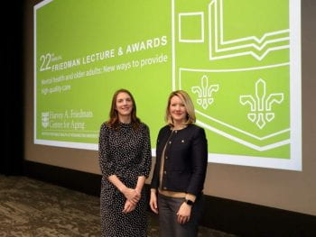 Beth Prusaczyk, PhD, MSW (left), receives the 2023 Alene and Meyer Kopolow Award for Geriatrics, Psychiatry and Neurology at the 22nd Annual Friedman Lecture & Awards ceremony.